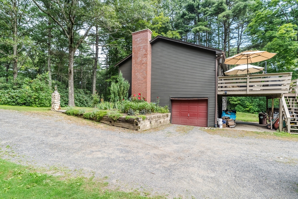 2 Gulf Road Pelham, MA 01002 - Photo 6 of 38 a view of a house with porch and garden
