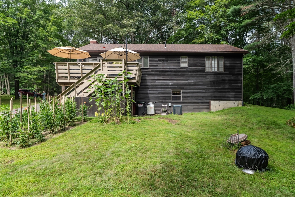 2 Gulf Road Pelham, MA 01002 - Photo 9 of 38 a front view of a house with garden