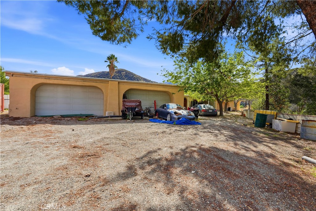 8235 Soledad Canyon Road Acton, CA 93510 - Photo 5 of 16 a view of a house with a yard
