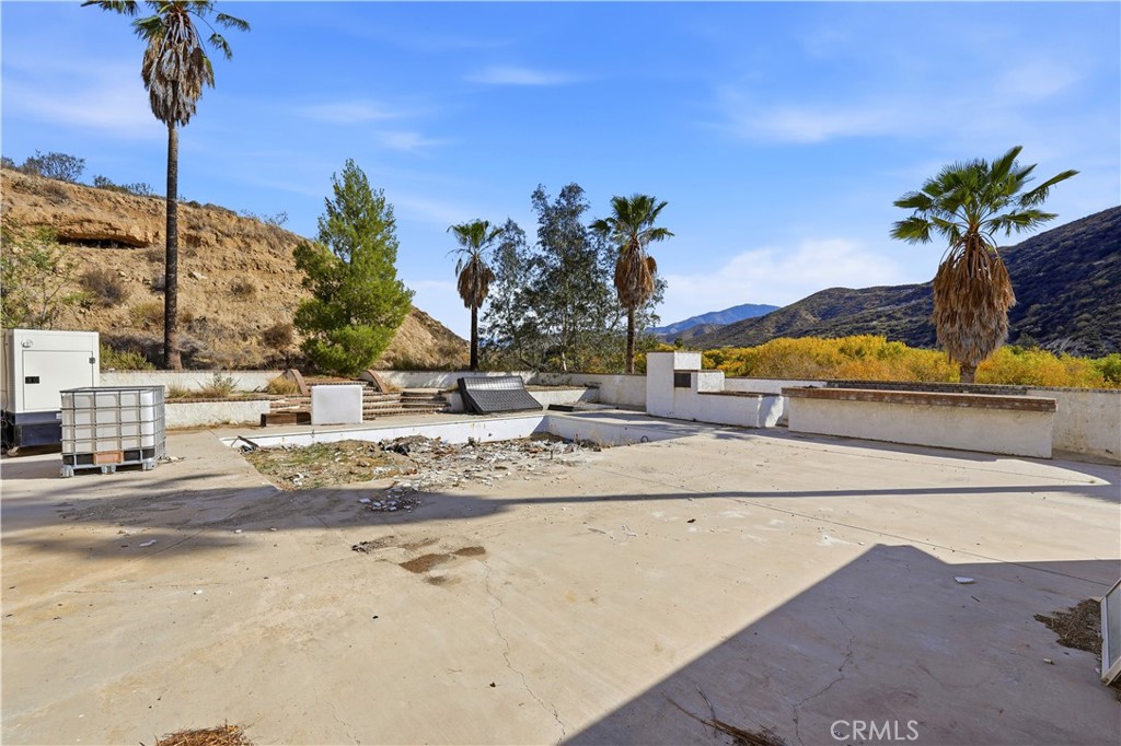 8235 Soledad Canyon Road Acton, CA 93510 - Photo 7 of 16 a view of a backyard of a house
