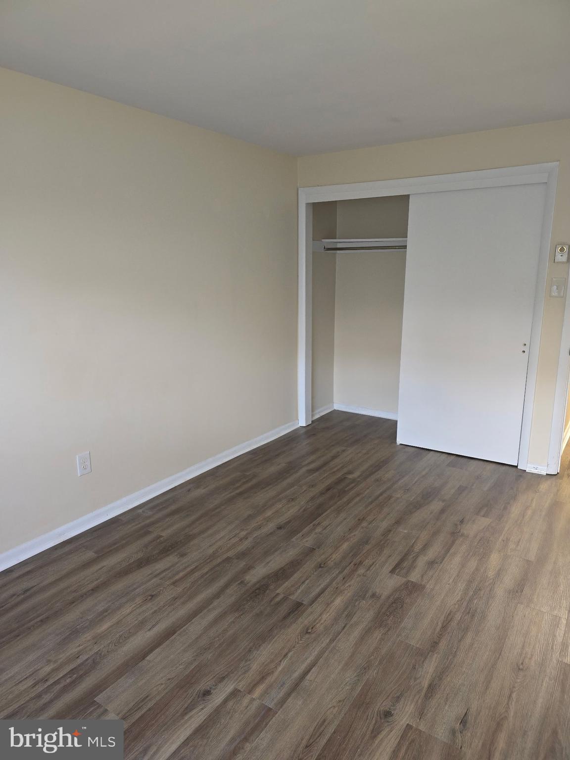 94 Governor Printz Boulevard, Unit 8 Claymont, DE 19703 - Photo 17 of 17 a view of empty room with wooden floor