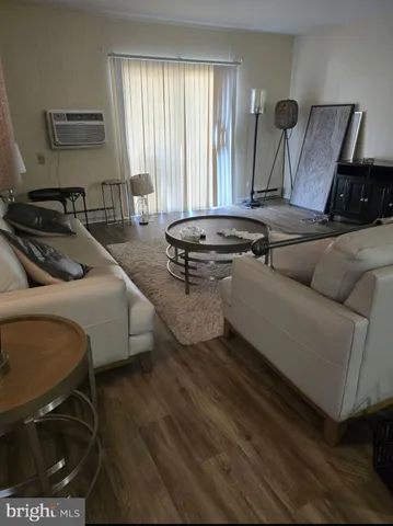 a bedroom with bed and window