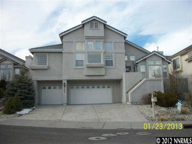 6259 Golden Meadow Road Reno, NV 89509 - Photo 1 of 1 a front view of a house with a garage