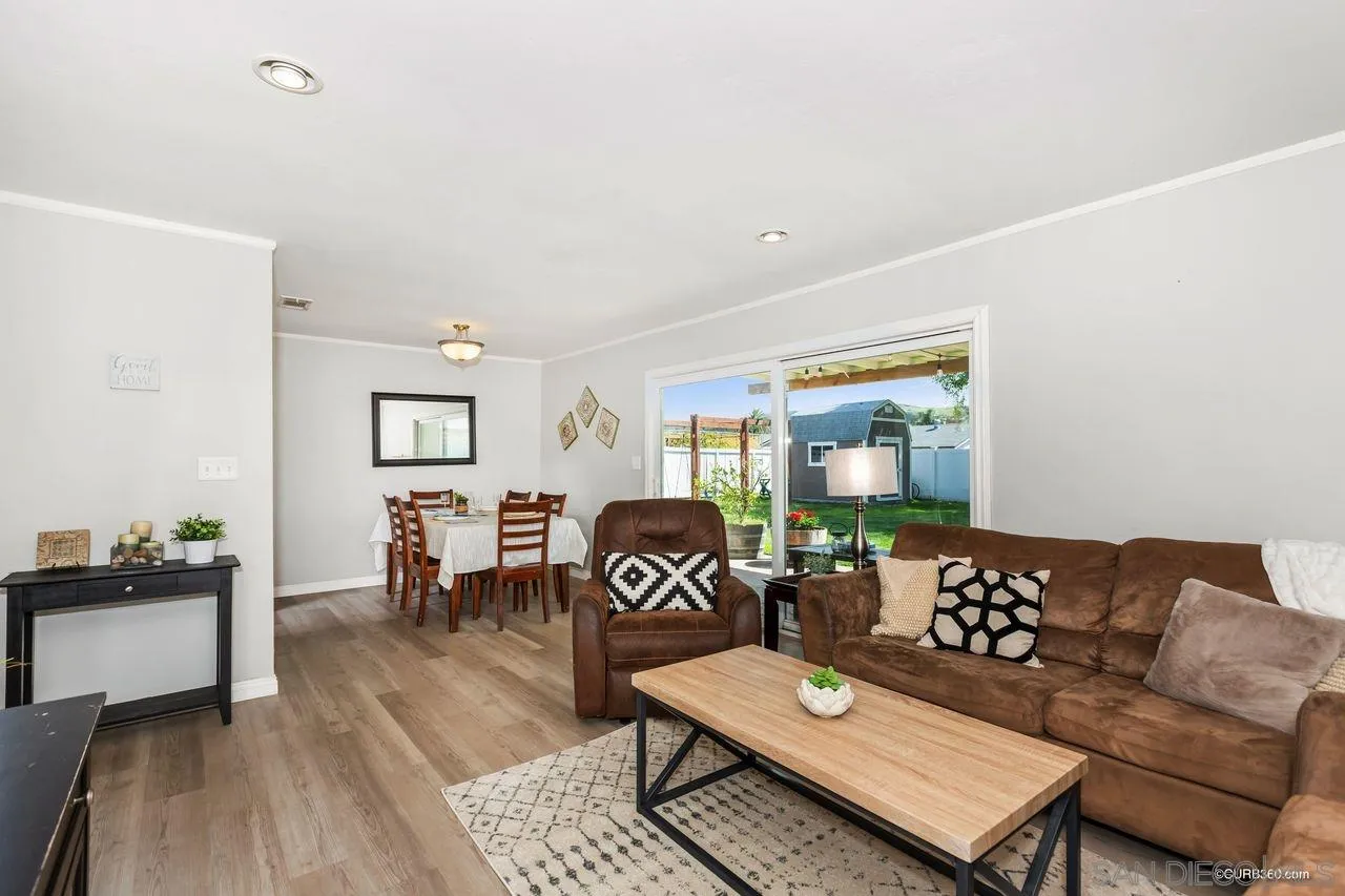 14525 Garden Road Poway, CA 92064 - Photo 7 of 25 a living room with furniture and a wooden floor