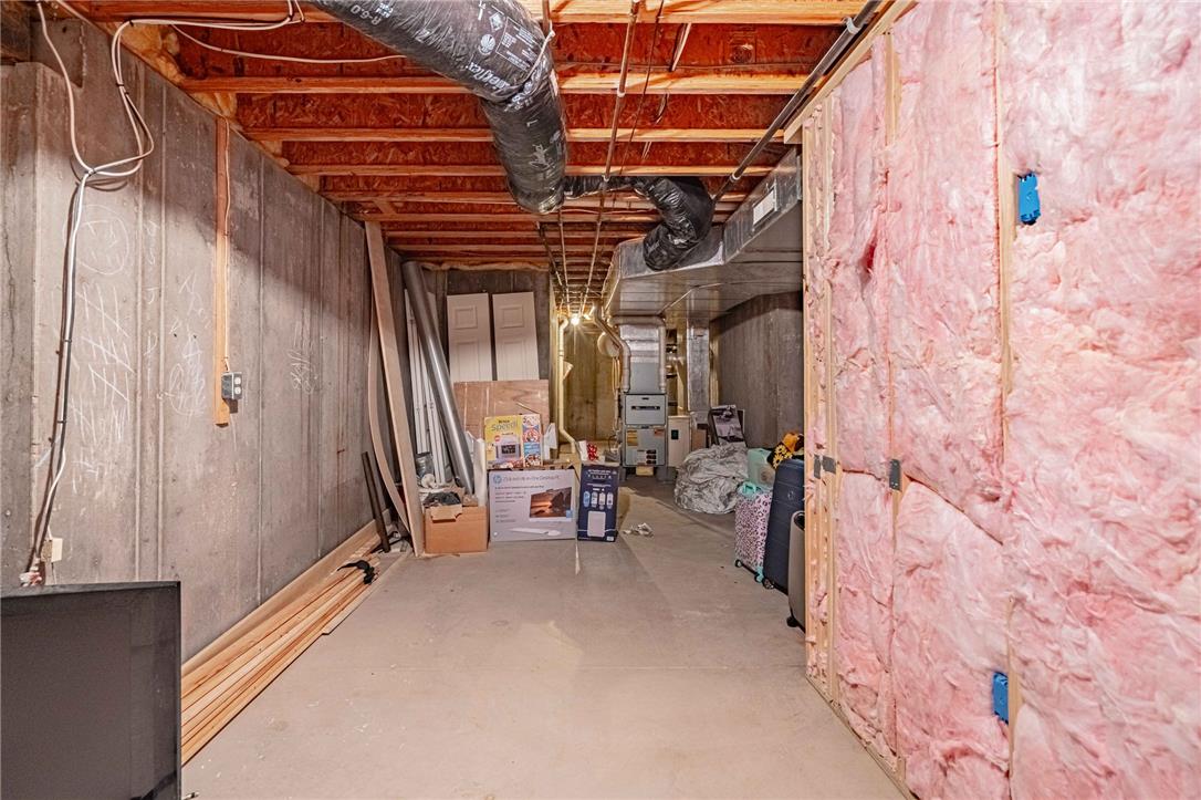102 Sutton Road Easton, PA 18045 - Photo 64 of 83 An unfinished basement offers ample potential for customization and storage.