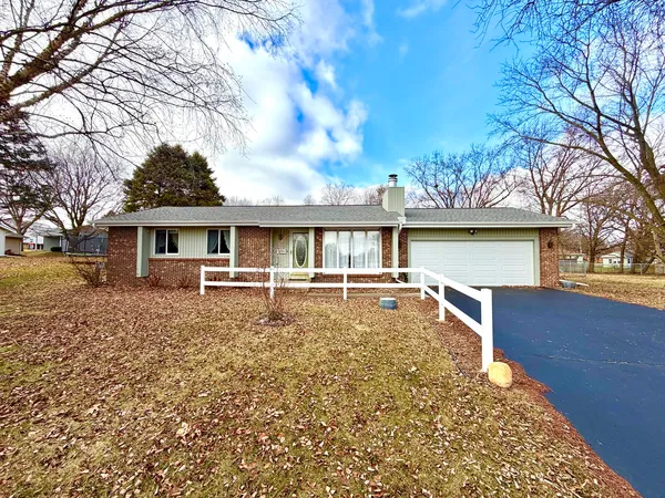 front view of house with a yard