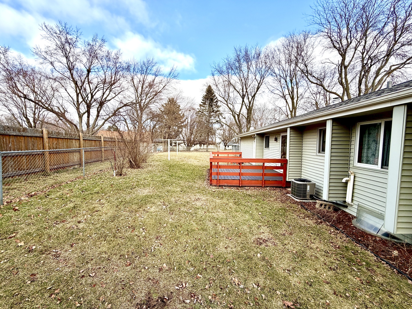 1211 Monroe Street Pecatonica, IL 61063 - Photo 3 of 19 a backyard of a house with oven and tree