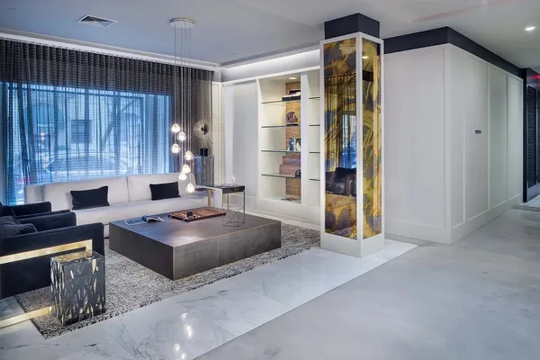 a living room with furniture and a window