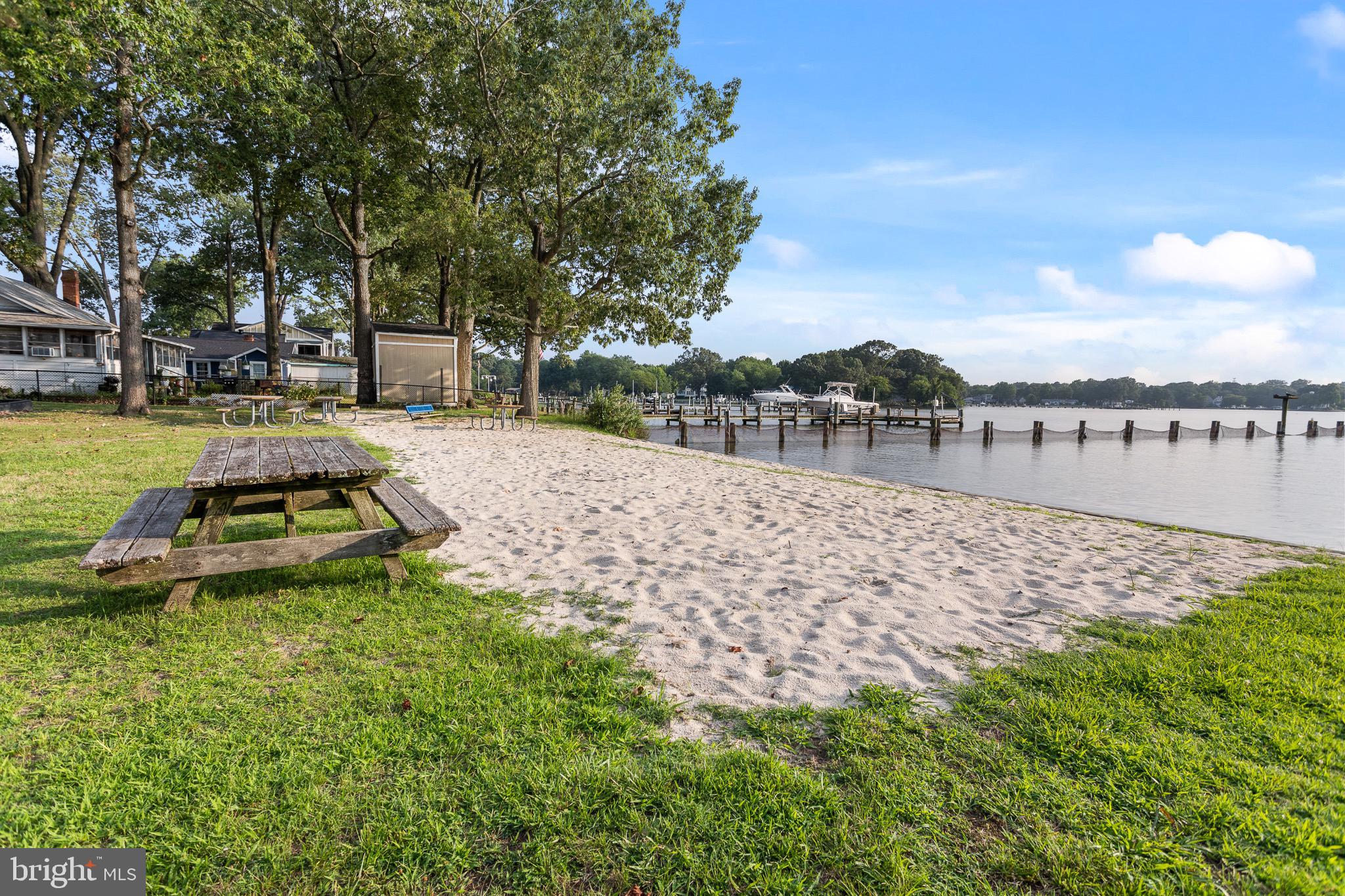 4912 Beech Street Shady Side, MD 20764 - Photo 30 of 42 a view of a lake with houses