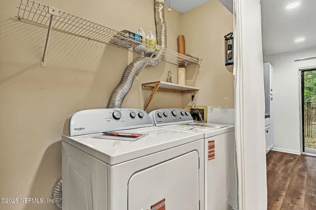 a utility room with dryer and washer