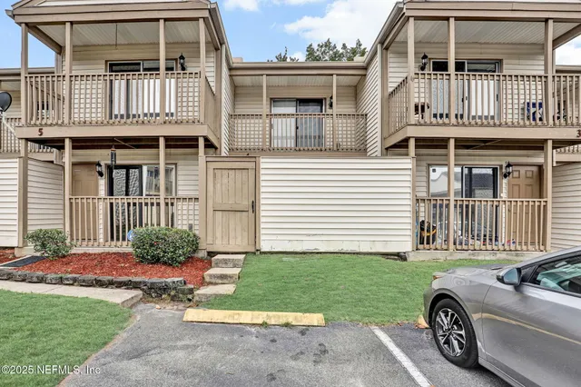 a car parked in front of a house