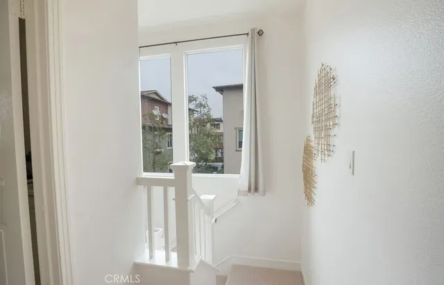 a kitchen with a sink stove and refrigerator