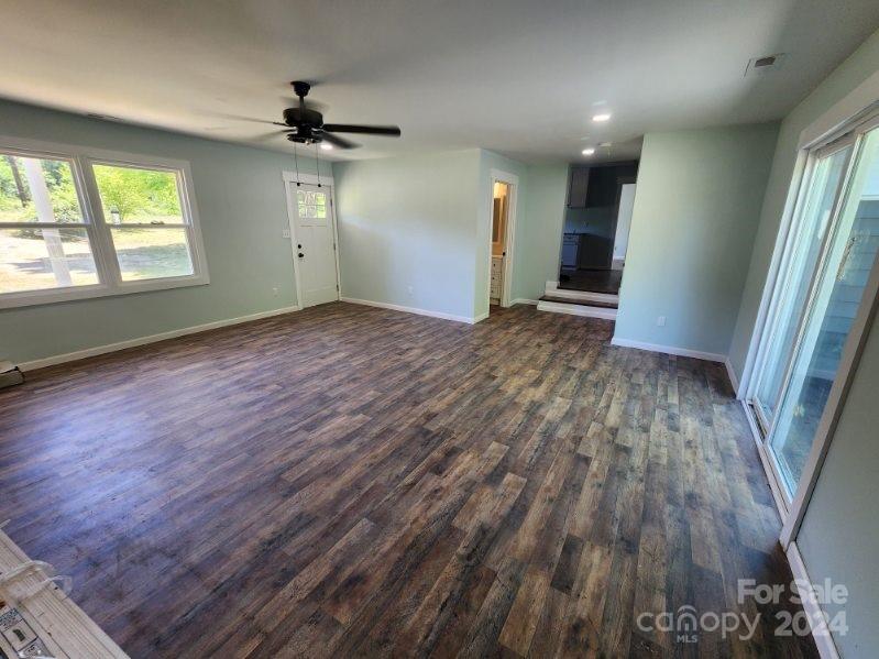 1004 Columbia Road Chester, SC 29706 - Photo 4 of 15 wooden floor in an empty room with a window