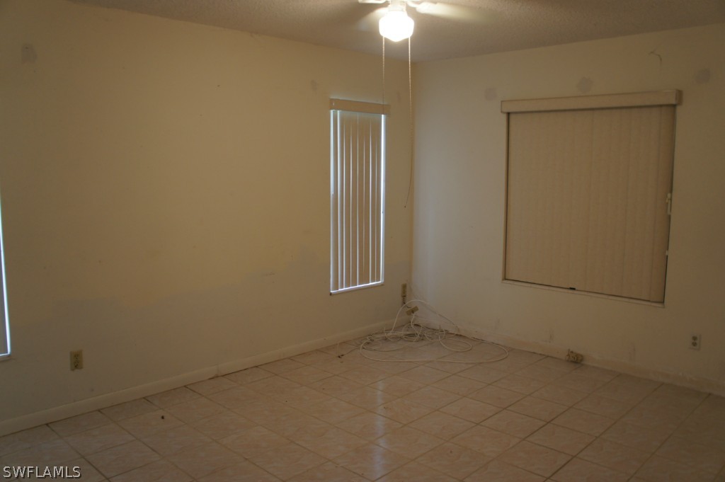 118 Rowland Road Lehigh Acres, FL 33936 - Photo 16 of 19 an empty room with a empty space