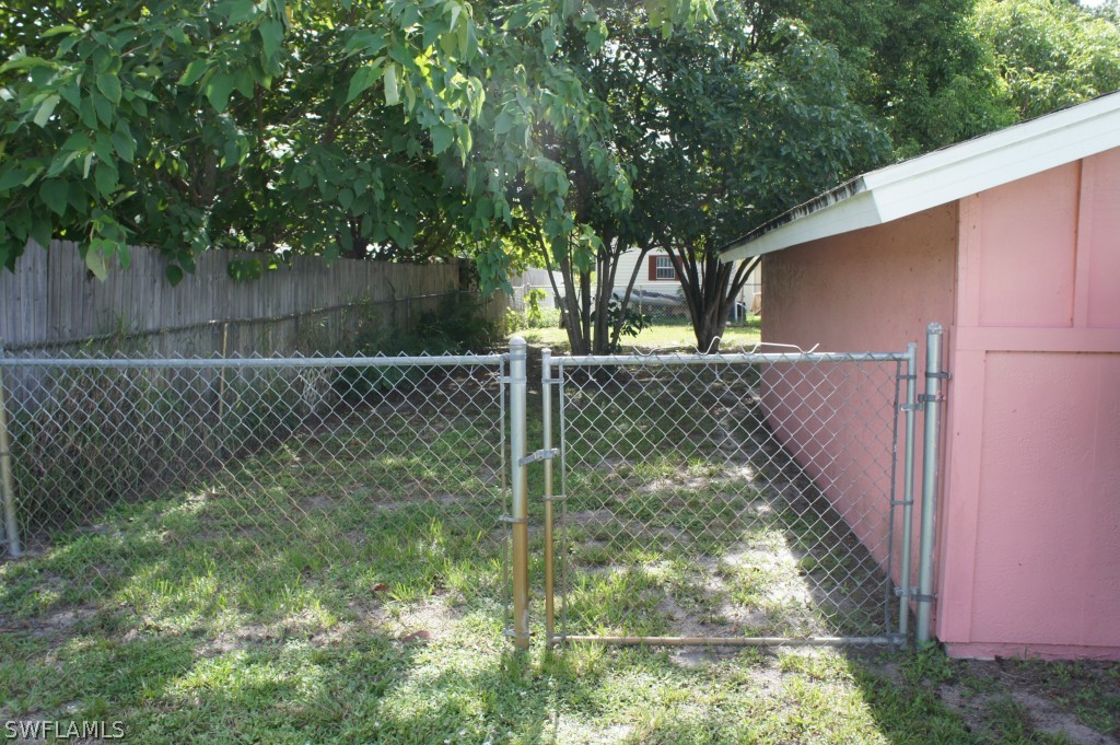 118 Rowland Road Lehigh Acres, FL 33936 - Photo 3 of 19 a view of a small yard