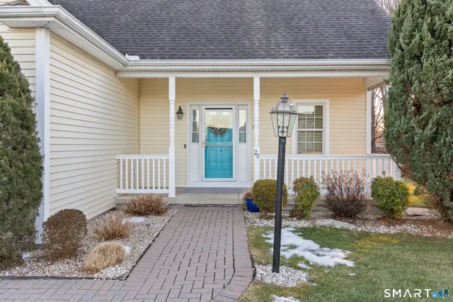 a front view of a house with porch