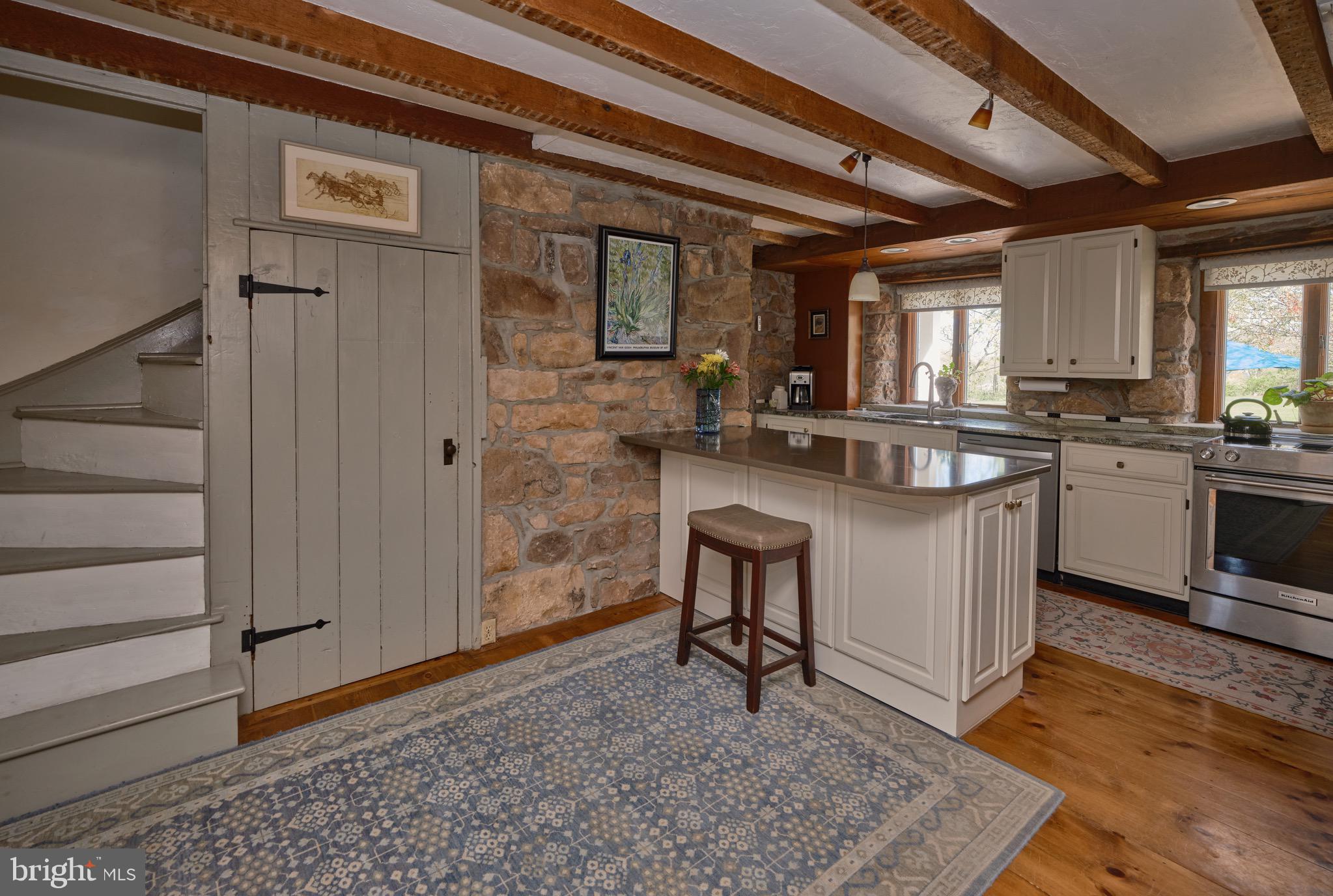 249 Ebelhare Road Pottstown, PA 19465 - Photo 11 of 47 a kitchen with stainless steel appliances granite countertop a sink stove and cabinets