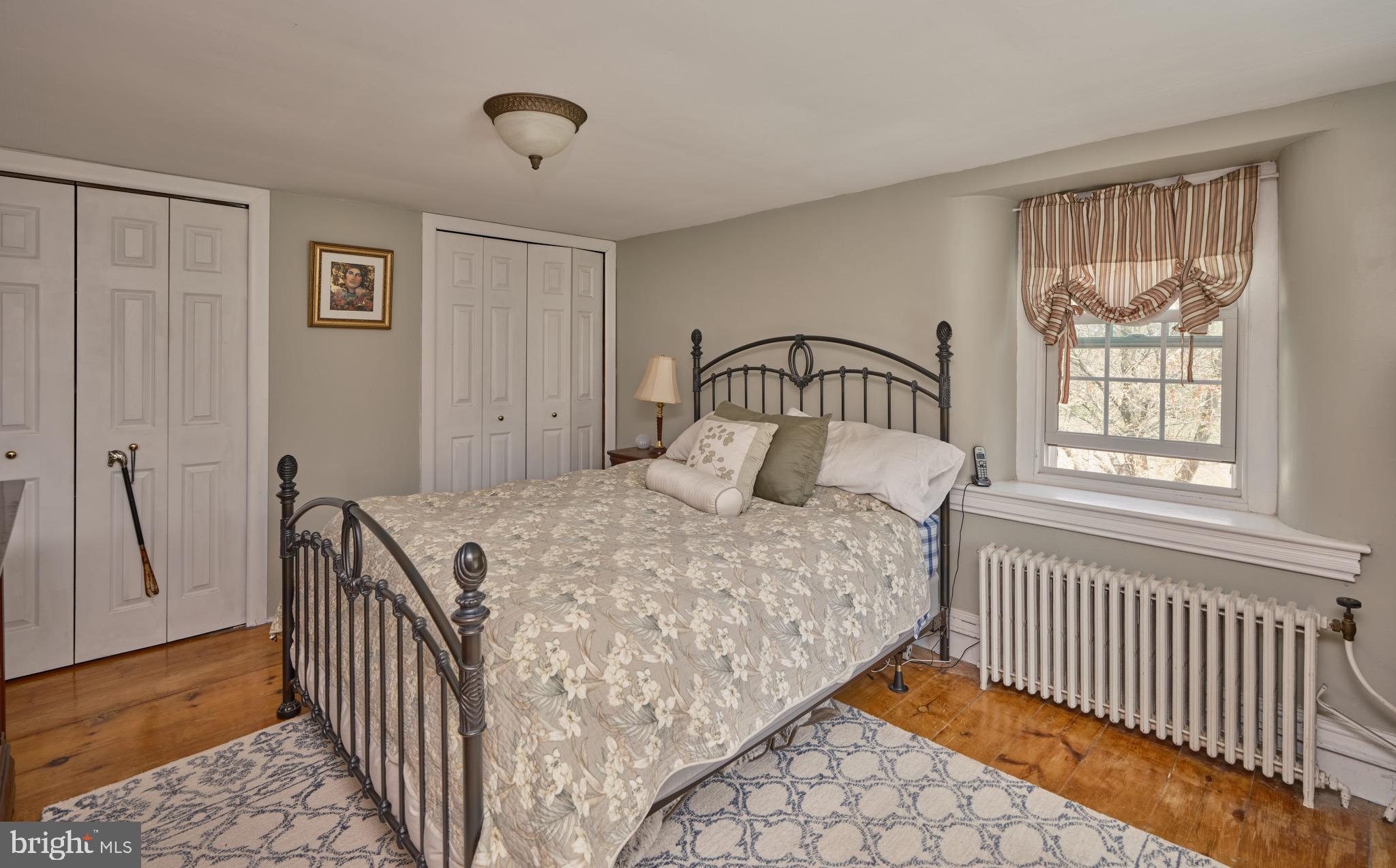 249 Ebelhare Road Pottstown, PA 19465 - Photo 23 of 47 a bedroom with a bed and a window