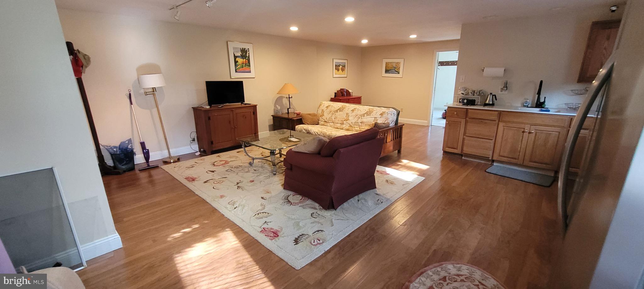 249 Ebelhare Road Pottstown, PA 19465 - Photo 40 of 47 a living room with furniture and a flat screen tv