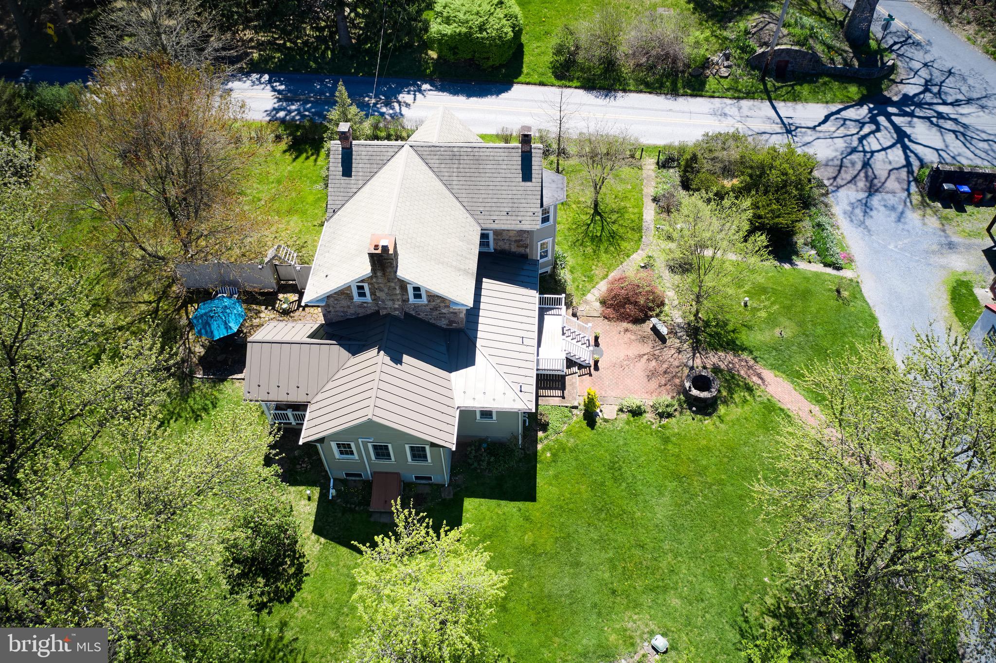 249 Ebelhare Road Pottstown, PA 19465 - Photo 45 of 47 an aerial view of a house with swimming pool and garden