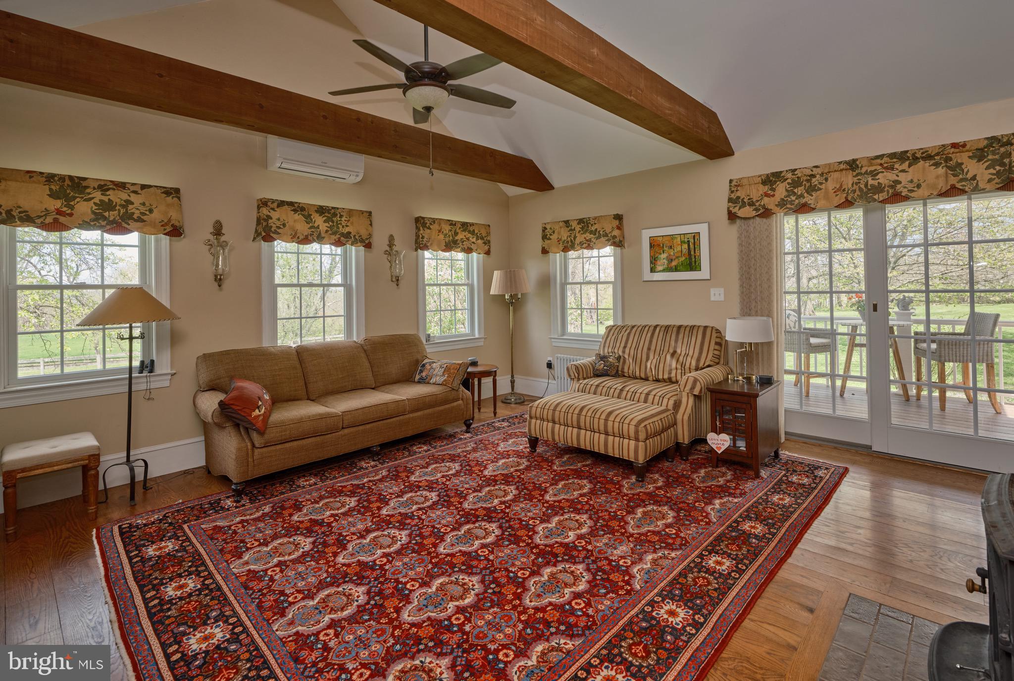 249 Ebelhare Road Pottstown, PA 19465 - Photo 6 of 47 a living room with furniture and a rug