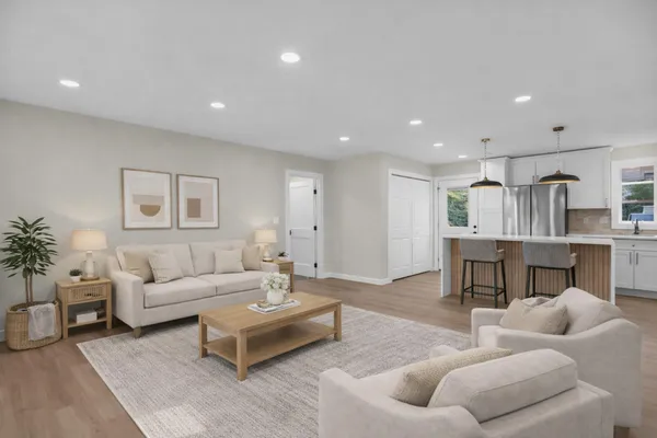 a living room with furniture and window