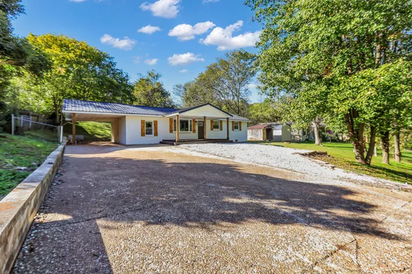 a house view with a garden space