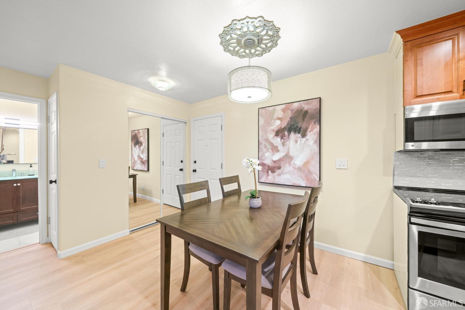 7323 Starward Drive, Unit 8 Dublin, CA 94568 - Photo 4 of 21 a view of a dining room with furniture