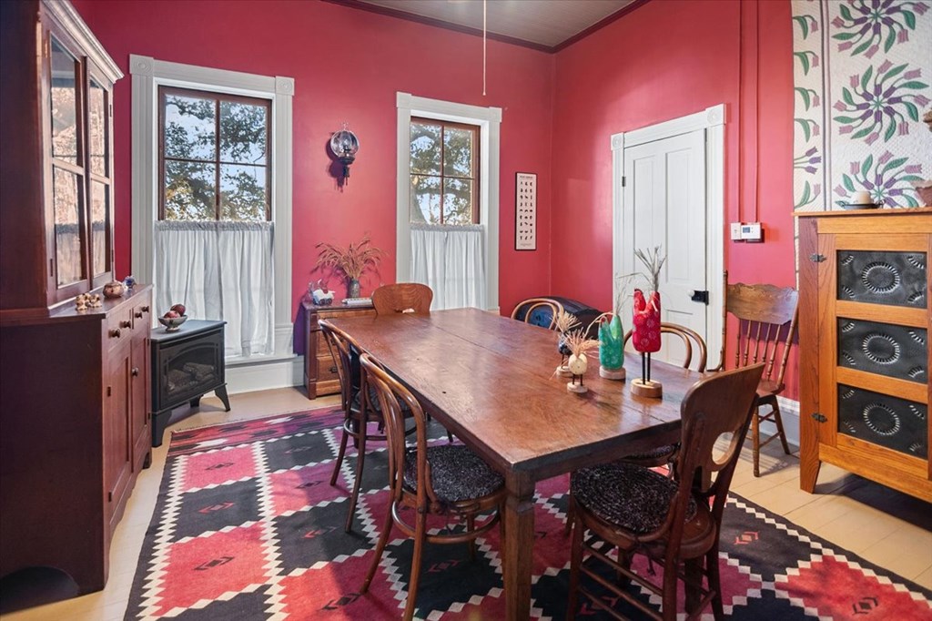 424 Moody Street Mason, TX 76856 - Photo 16 of 49 a view of a dining room with furniture and a rug
