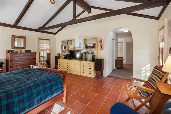 a bathroom with a double vanity sink and a large mirror
