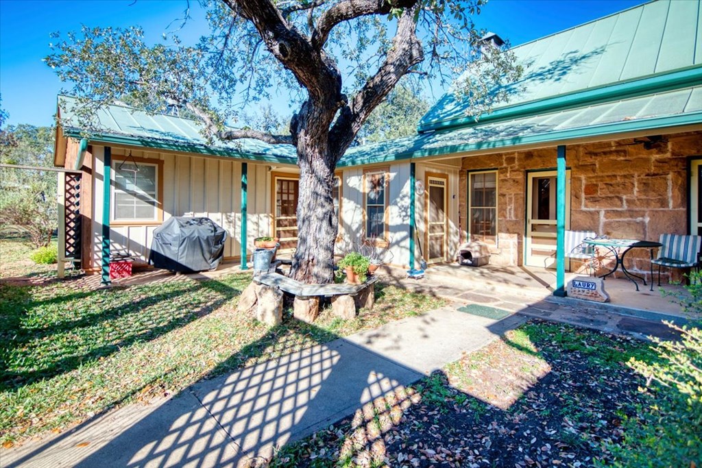 424 Moody Street Mason, TX 76856 - Photo 30 of 49 a view of a backyard with sitting area