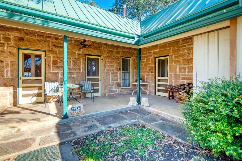 424 Moody Street Mason, TX 76856 - Photo 31 of 49 a view of a house with backyard porch and sitting area