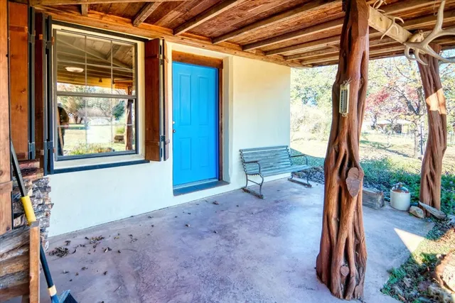 a bedroom with furniture and a gym equipment