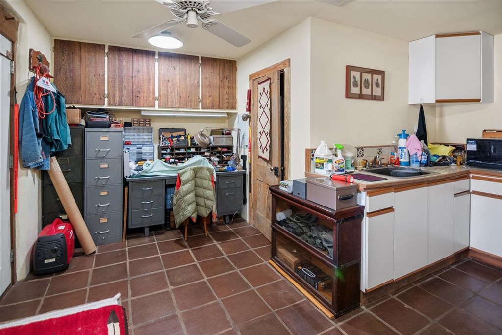 424 Moody Street Mason, TX 76856 - Photo 37 of 49 a room with storage and utility