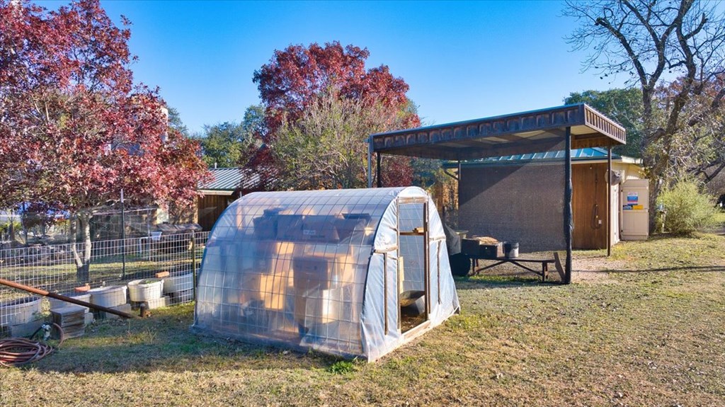 424 Moody Street Mason, TX 76856 - Photo 43 of 49 a view of a house with backyard and trees