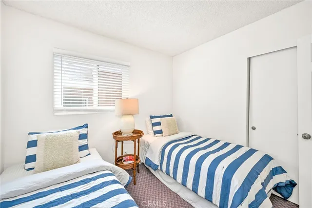 a bathroom with a sink toilet and a mirror