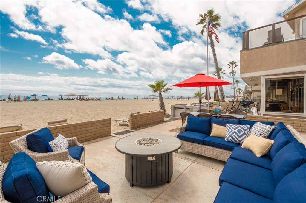 4103 Seashore Drive Newport Beach, CA 92663 - Photo 54 of 62 a view of a patio with couches and pool