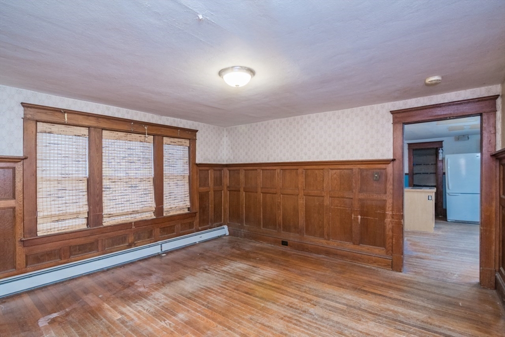 110 Old Amherst Road Sunderland, MA 01375 - Photo 14 of 41 a view of an empty room with wooden floor and a window