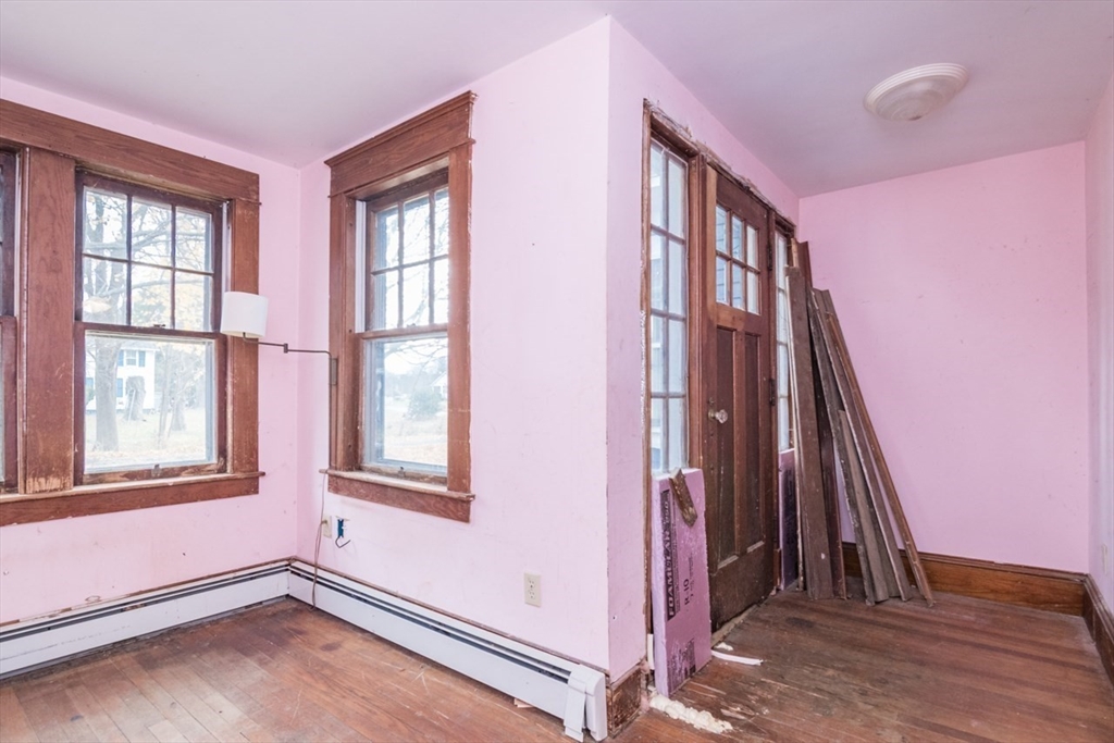 110 Old Amherst Road Sunderland, MA 01375 - Photo 15 of 41 wooden floor and windows in a room