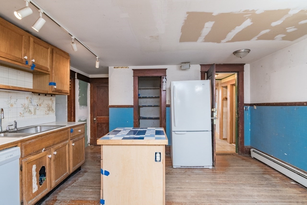 110 Old Amherst Road Sunderland, MA 01375 - Photo 19 of 41 a kitchen with a refrigerator and a sink
