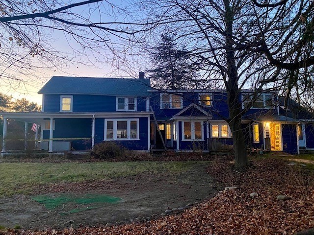 110 Old Amherst Road Sunderland, MA 01375 - Photo 2 of 41 a front view of a house with a yard