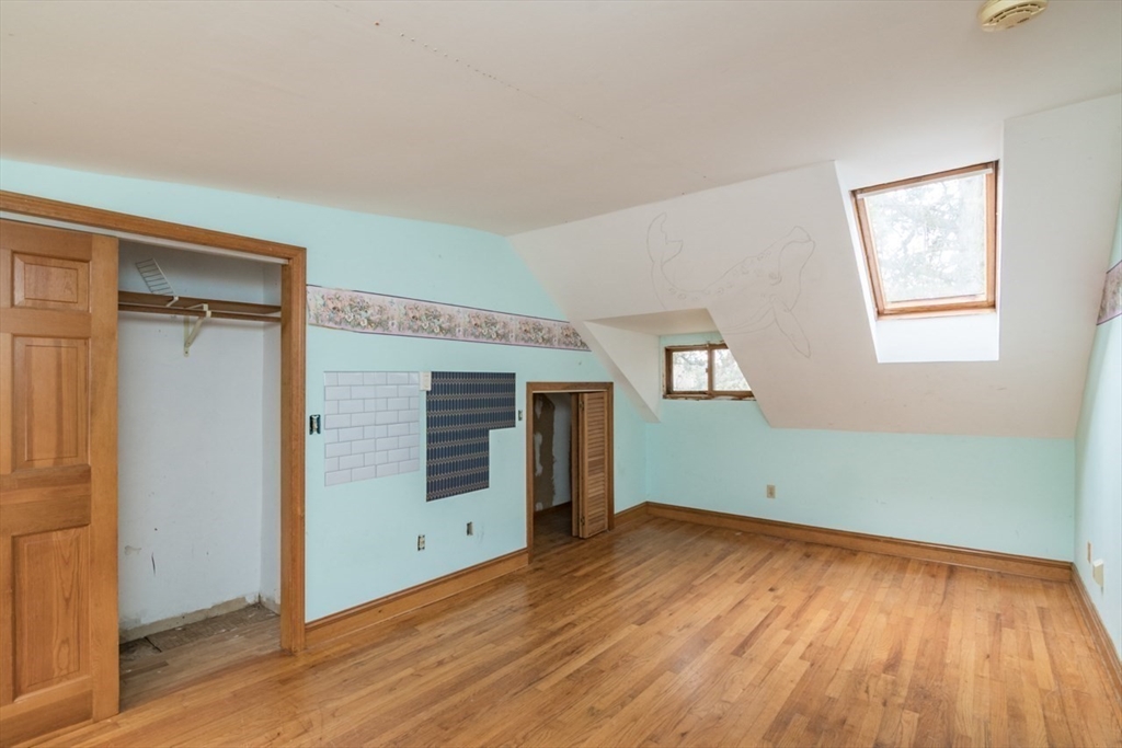 110 Old Amherst Road Sunderland, MA 01375 - Photo 24 of 41 a view of empty room with wooden floor and fan