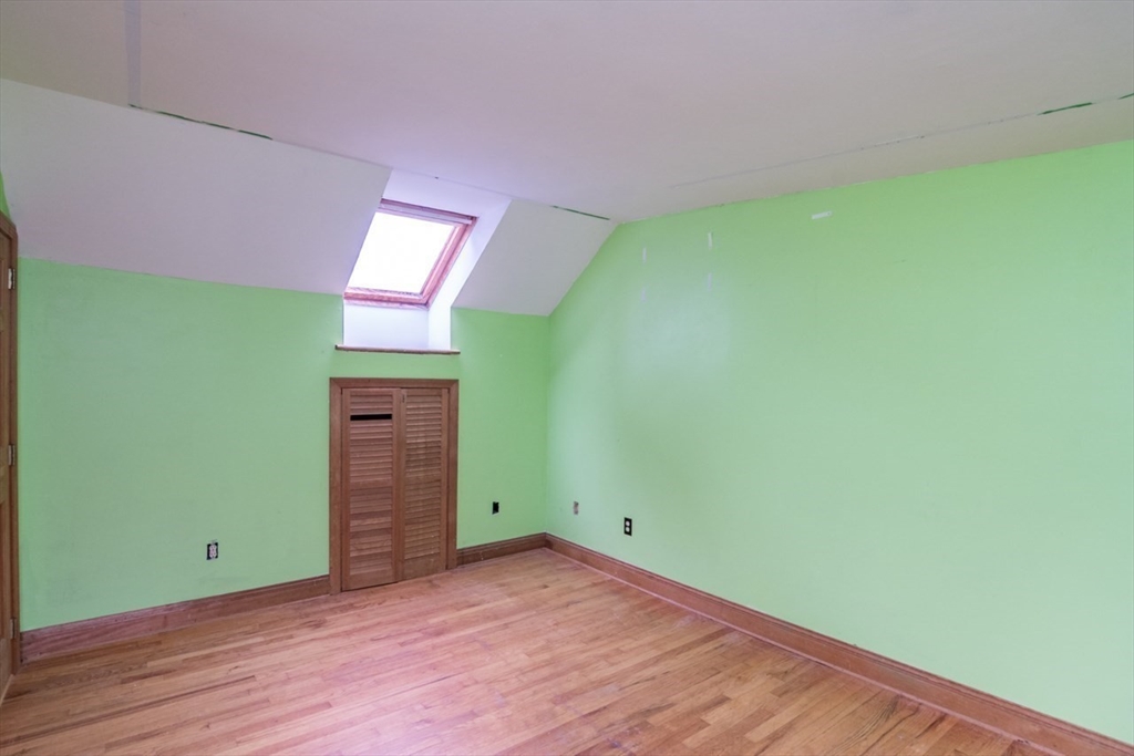 110 Old Amherst Road Sunderland, MA 01375 - Photo 26 of 41 a view of empty room with window and wooden floor