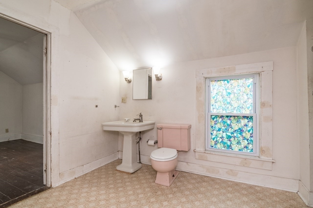 110 Old Amherst Road Sunderland, MA 01375 - Photo 33 of 41 a bathroom with a sink toilet and a window