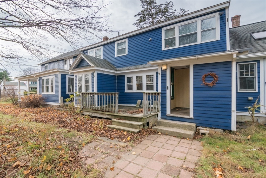 110 Old Amherst Road Sunderland, MA 01375 - Photo 40 of 41 two chairs and a table in the backyard of the house