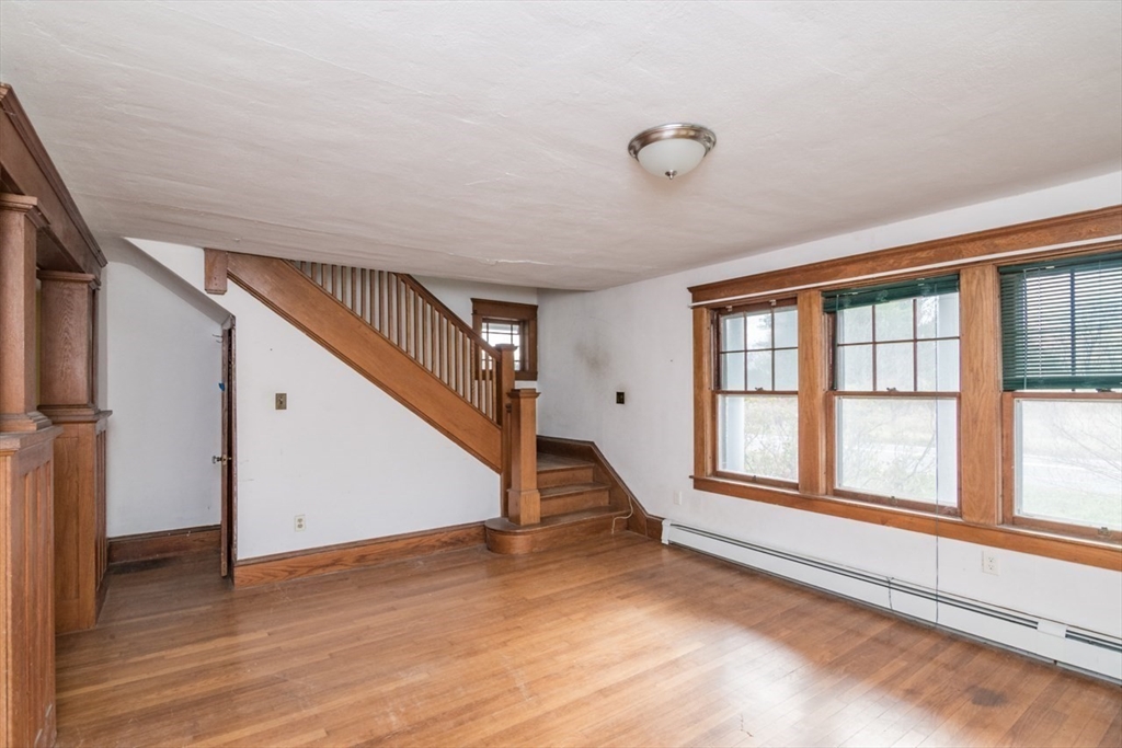 110 Old Amherst Road Sunderland, MA 01375 - Photo 8 of 41 a view of an entryway with wooden floor and staircase