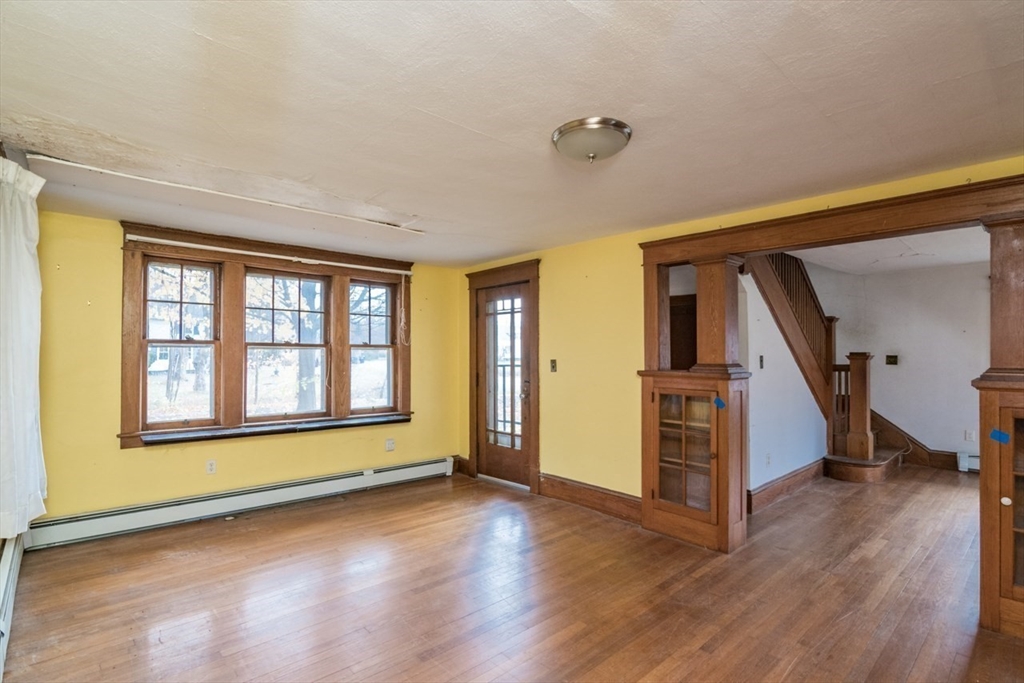 110 Old Amherst Road Sunderland, MA 01375 - Photo 10 of 41 a view of empty room with wooden floor and fan