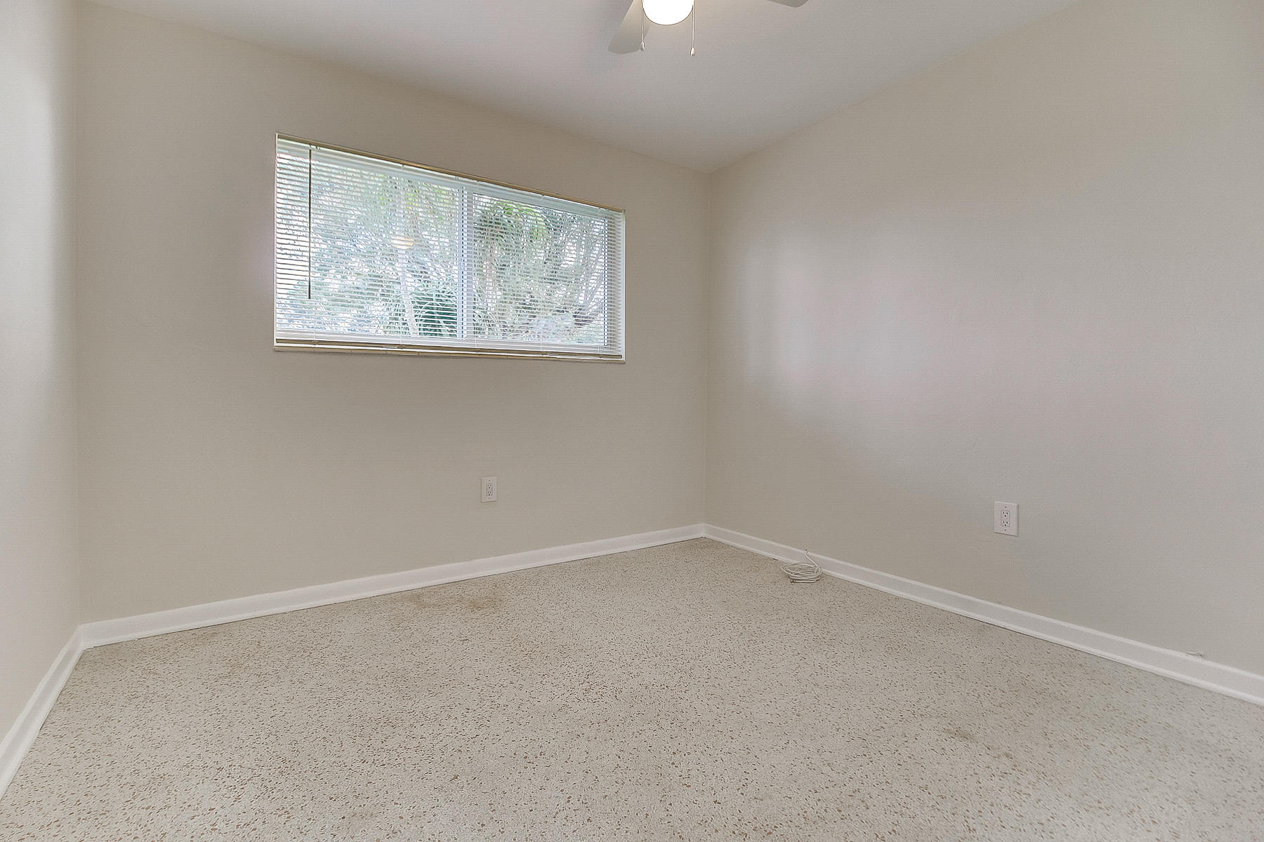 352 East Lake Road Palm Springs, FL 33461 - Photo 15 of 31 an empty room with a workbench