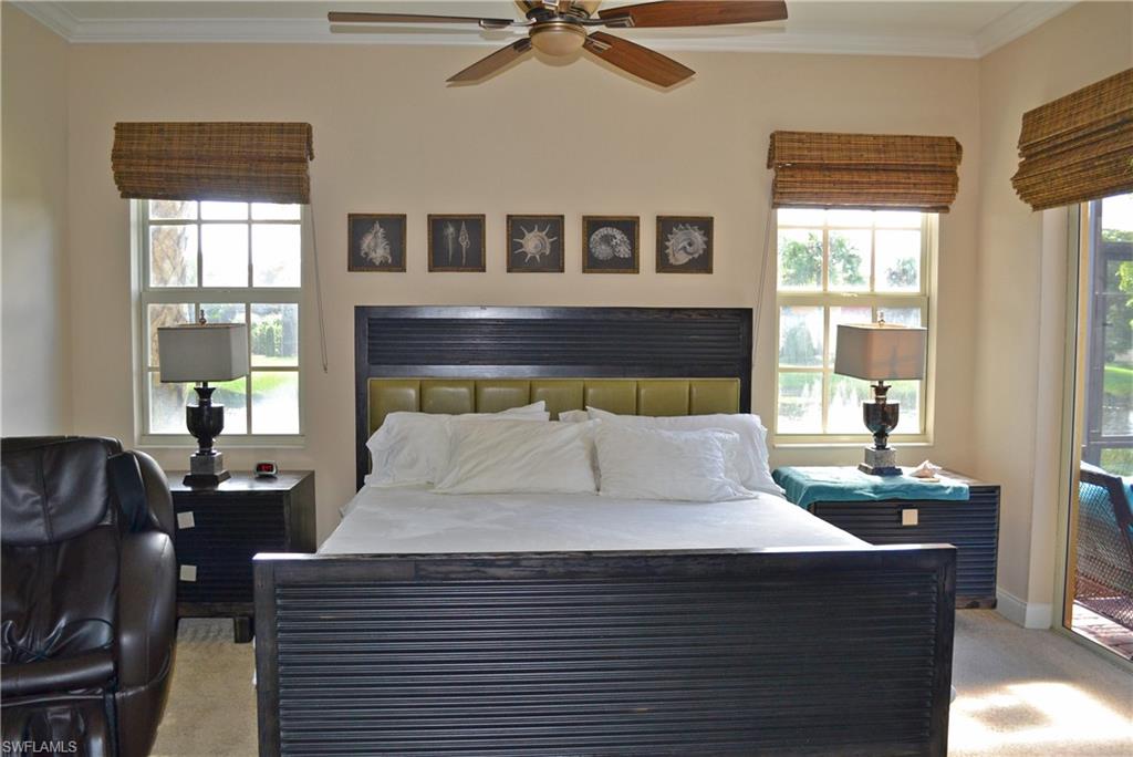 22160 Ponte Romano Lane Estero, FL 33928 - Photo 12 of 17 a bedroom with a bed window and couch