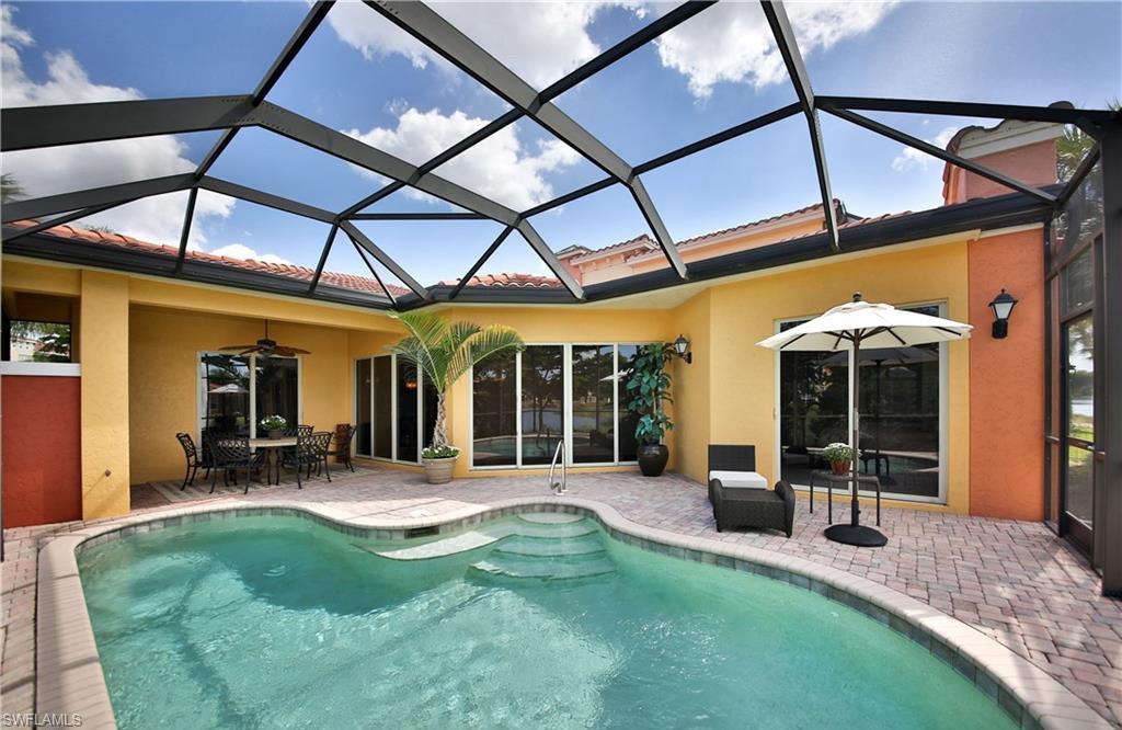 22160 Ponte Romano Lane Estero, FL 33928 - Photo 14 of 17 a view of a house with backyard and porch
